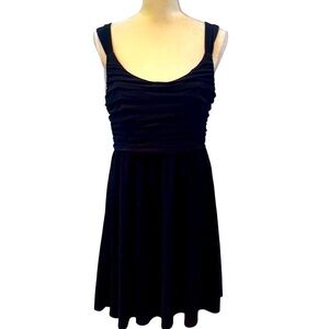 ABS sleeveless black shirred bodice polyester dress. Lined.Side zip. Size Large